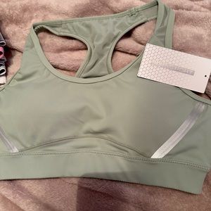 5 sports bras 4 worn 1 brand new with tags